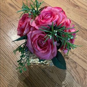 Faux pink flowers.